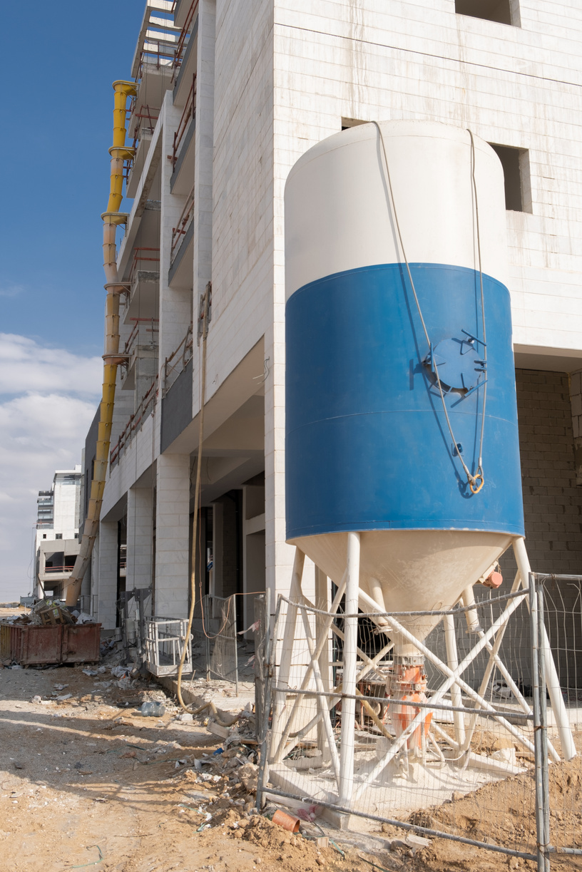 Stationary concrete batching plant on the construction site in Israel.